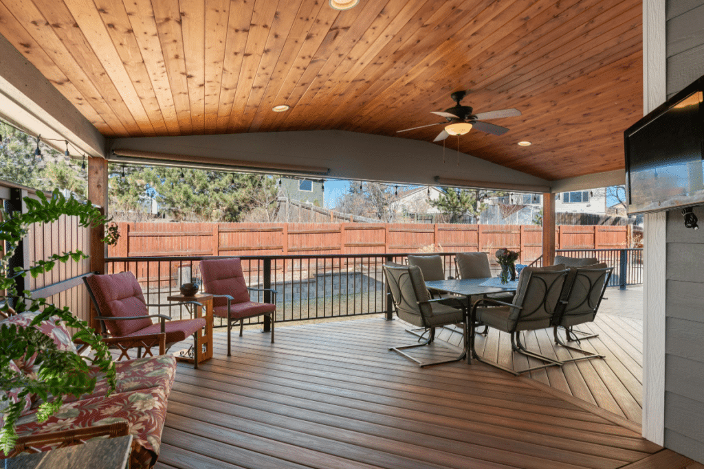 Patio screening - A detailed aluminum structure framework for a patio enclosure, prominently featured in the foreground, showcasing clean lines and modern design. The aluminum beams should be arranged in a geometric pattern, highlighting their strength and durability, with a polished silver finish that reflects sunlight. In the middle ground, workers in professional attire carefully examine blueprints and discuss the design details, emphasizing the planning aspect. The background features a partially enclosed patio with lush greenery and a clear blue sky, creating a serene outdoor atmosphere. The image should be captured with a wide-angle lens to emphasize the scale and intricacies of the structure. Soft, natural lighting enhances the overall scene, conveying a sense of professionalism and careful planning in home improvement.